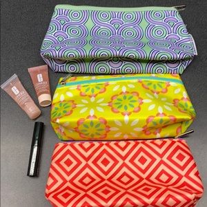 Clinique makeup bags, mascara, and moisture surge